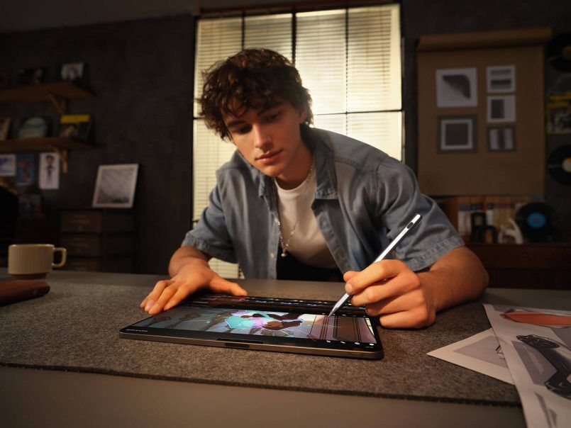 Creator sketching design concepts on a digital tablet